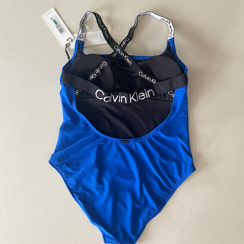 Calvin Klein Blue S/M/L
Deep U-Back Criss-Cross Logo Elastic One-Piece Swimsuit - Picture 4 of 4